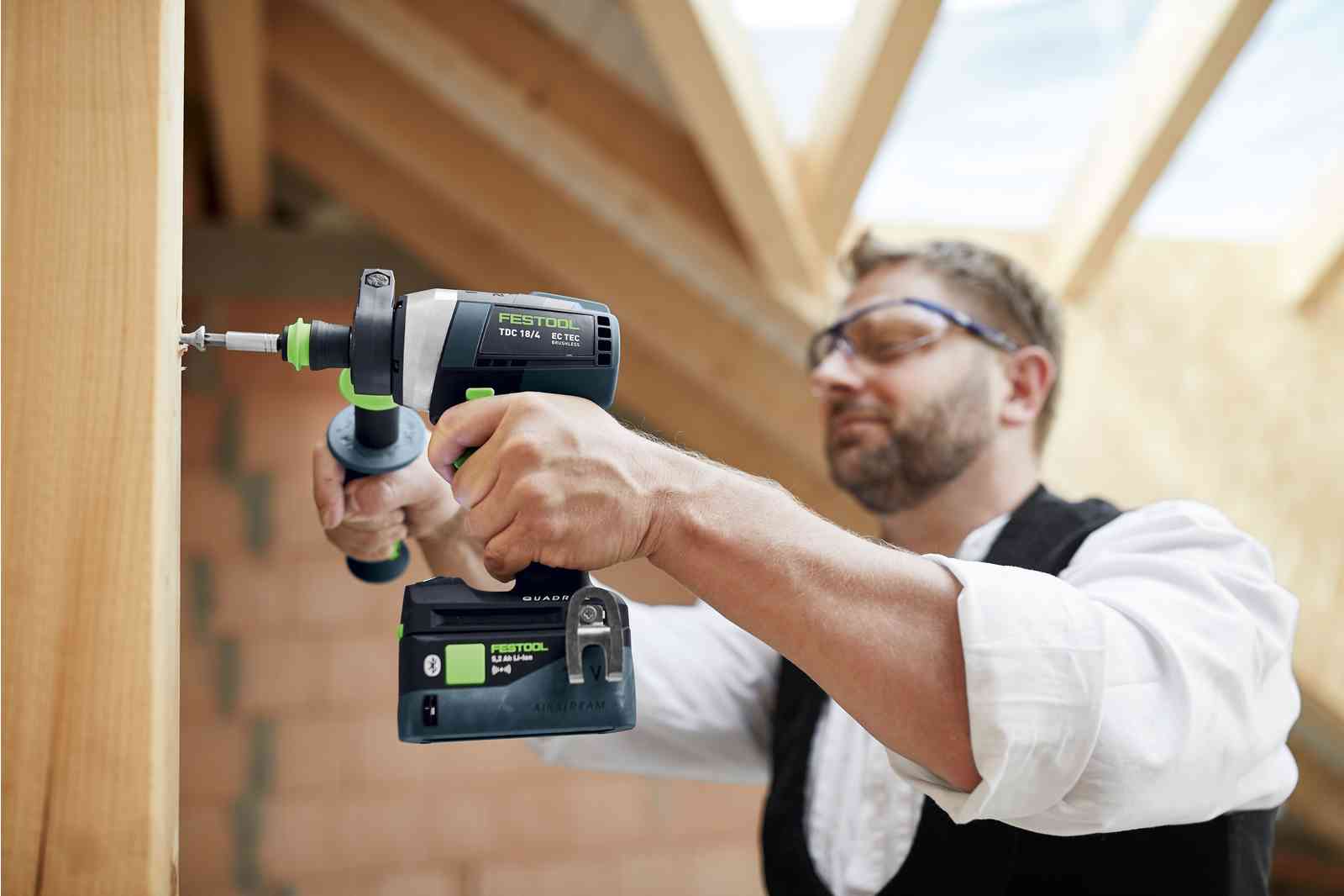 Carpenter installing a door